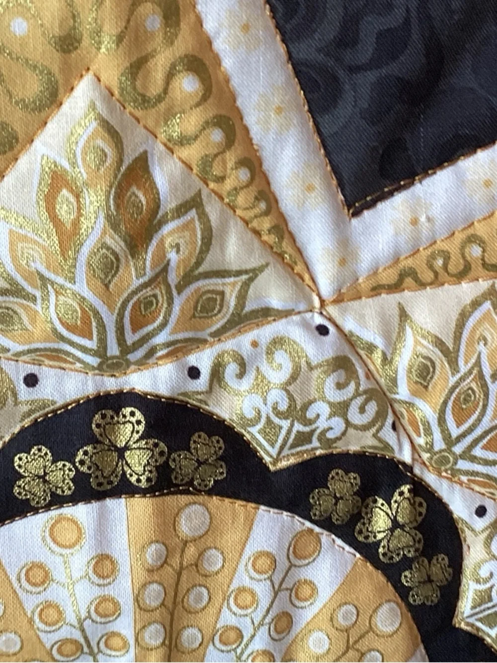 NWT. Gold and Black Star Lap Quilt